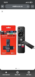 4K streaming TV stick with voice remote and retail packaging